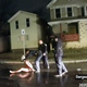In this image taken from police body camera video provided by Roth and Roth LLP, a Rochester police officer puts a hood over the head of Daniel Prude, on March 23, 2020, in Rochester, N.Y.